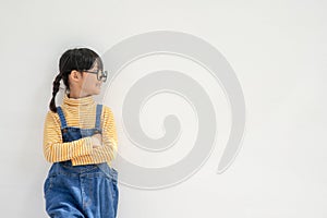 Portrait of funny smiling little girl child wearing glasses