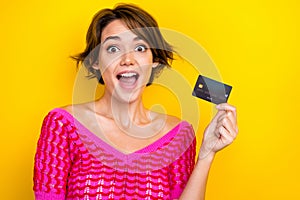 Portrait of funny young business promoter girl new banking system how save more money online shopping hold ecard