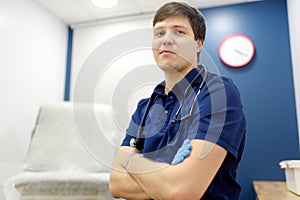 Portrait of general practitioner in medical office during appointment of patient