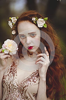 Portrait of Gentle woman with long red hair sroz. Red-haired sensual girl with pale skin and blue eyes with bright