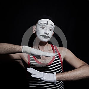 Portrait of gesticulating mime