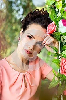 Portrait of a girl on a background of flowers