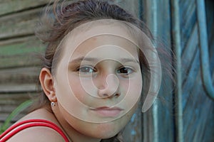 Portrait of a girl close-up in the village