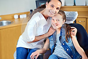 Portrait, girl and dentist with child, woman and consultation for medical procedure and oral health. Face, professional