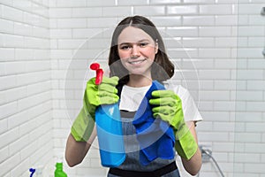 Portrait of girl doing cleaning in bathroom