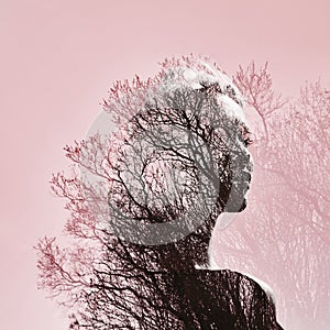 Portrait of a girl with double exposure against a tree crown. De