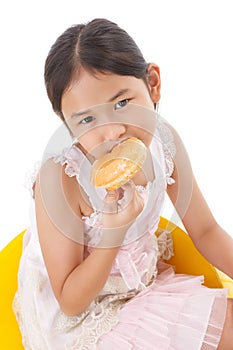 Portrait of girl eatting donuts