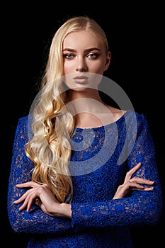 Portrait of girl in evening dress with wavy hair