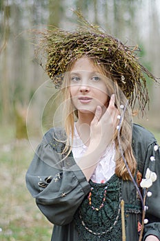 Portrait of a girl in a folk medieval style with a circlet