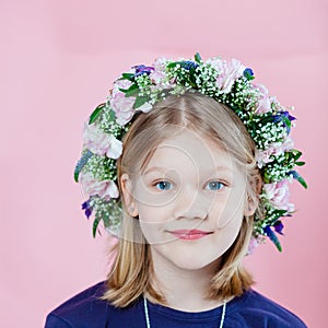 Portrait of a girl with garland