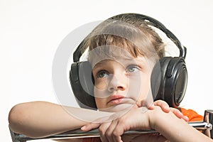 Portrait of girl in headphones listening to music musically