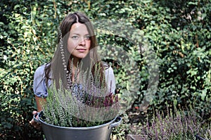 Portrait of a girl with heather photo