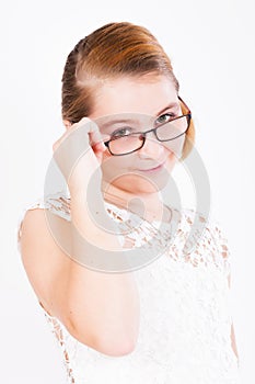 Portrait of girl holding glasses