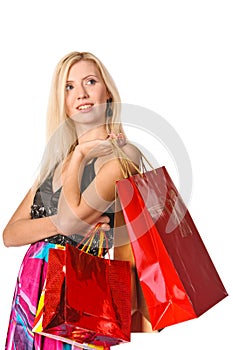 Portrait of a girl holding handbags and smiling