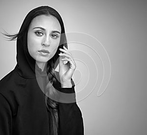 Black and white portrait of a girl in the hood