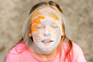 Portrait of a girl for Indian festival of colors Holi