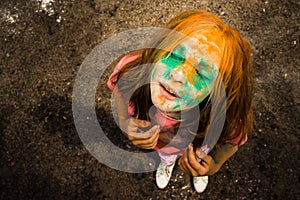 Portrait of a girl for Indian festival of colors Holi