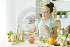 Portrait of girl in the kitchen cook