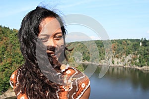 Portrait of girl by lake