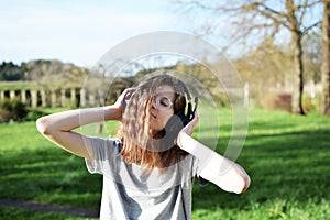 Portrait of girl listening music