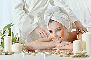 Portrait of girl lying down on a massage bed