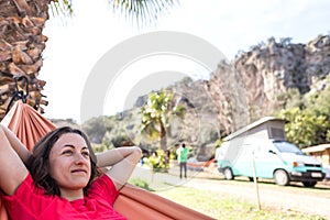 Portrait of a girl lying in a hammock