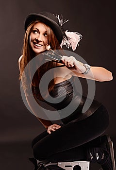 Portrait of girl makeup artist with brushes