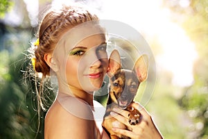 Portrait of a girl with Miniature Pinscher