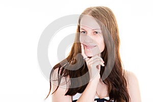 Portrait girl pensive young woman smiling looking aside with beauty cute smile posing in white copy space wall background