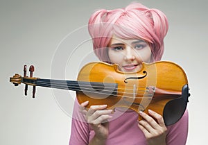 Portrait of girl in pink wig