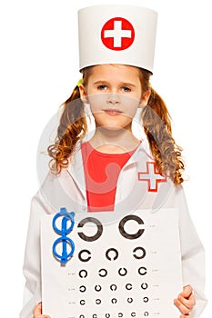 Portrait of girl playing doctor ophthalmologist