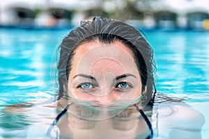 Portrait of a girl in the pool