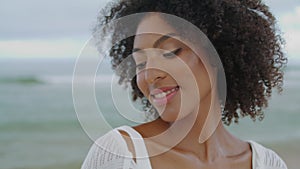 Portrait girl posing ocean on cloudy day. Playful romantic woman rest on beach