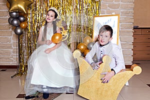 Portrait of girl princess in white dress and man in white shirt