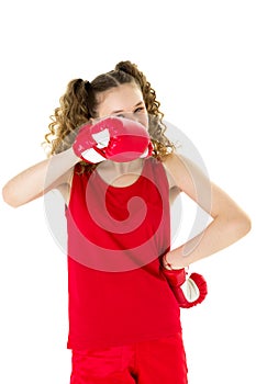 Portrait of girl in red boxing gloves ready fight