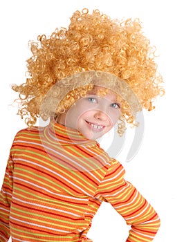 Portrait of girl in red curly wig.