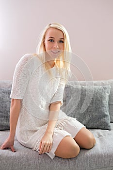 Portrait of a girl relaxing on a sofa at home