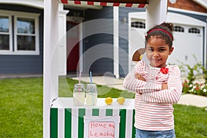 Portrait Of Girl Running Homemade Lemonade Stand