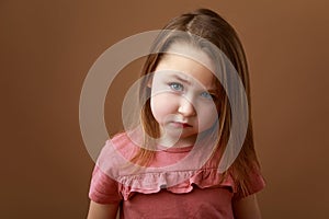 Portrait of a girl showing emotion of anger
