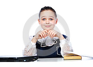 Portrait of a girl sitting at a school desk, school, classroom,