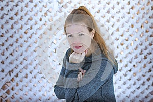 Portrait of a girl on a snowy background