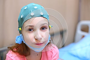 Portrait of girl in a special cap for