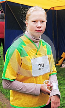 Portrait girl on sport orienteering competitions