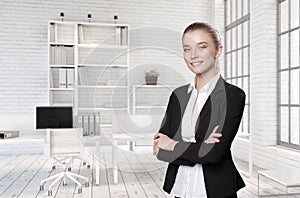 Portrait of girl in suit in bright office