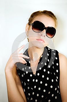 Portrait of the girl in sunglasses