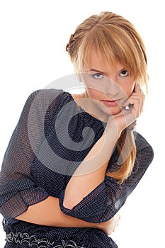 Portrait girl teenager holds hand near cheeks