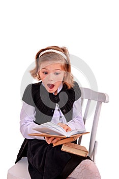 Portrait of a girl teenager reading book