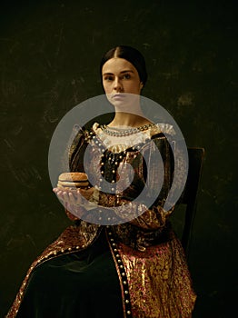 Portrait of a girl wearing a retro princess or countess dress photo