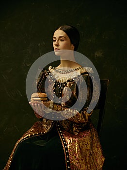 Portrait of a girl wearing a retro princess or countess dress