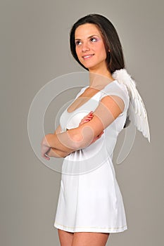 Portrait of girl with white angel wings